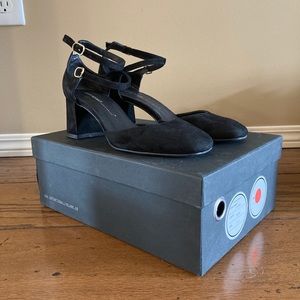 Intentionally left Blank black leather suede heels